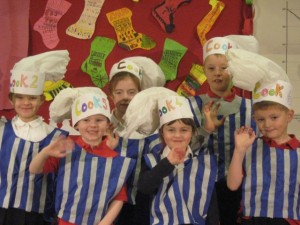 The School Cooks give the audience a wave